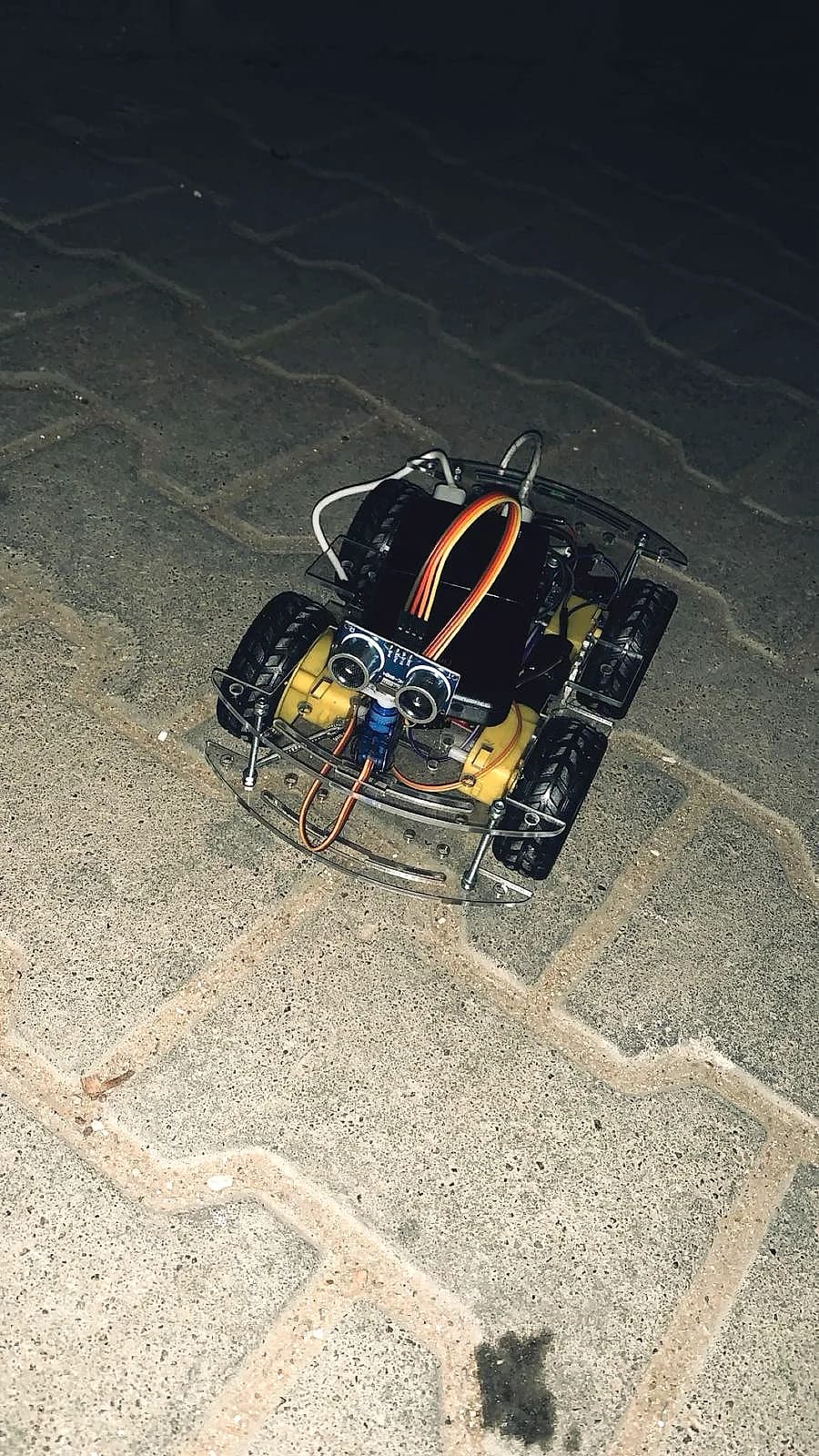 The finished build — sensor, motors, chassis